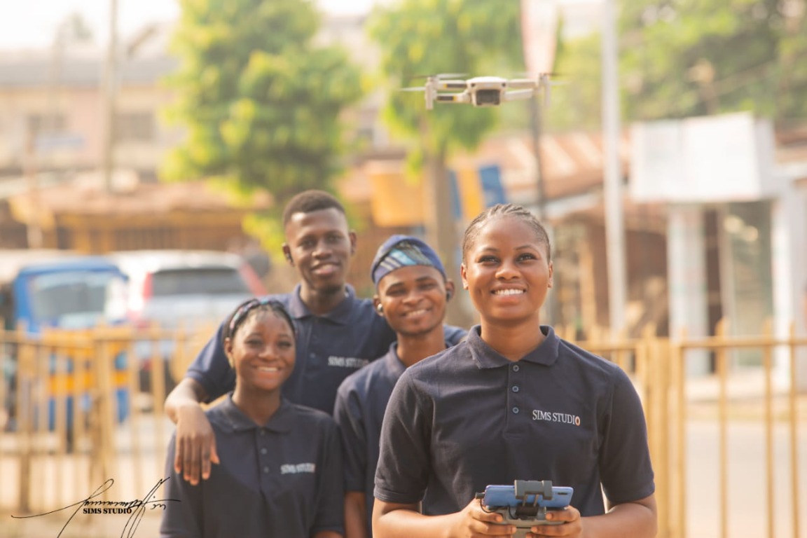 Sims Studio Academy students with a drone