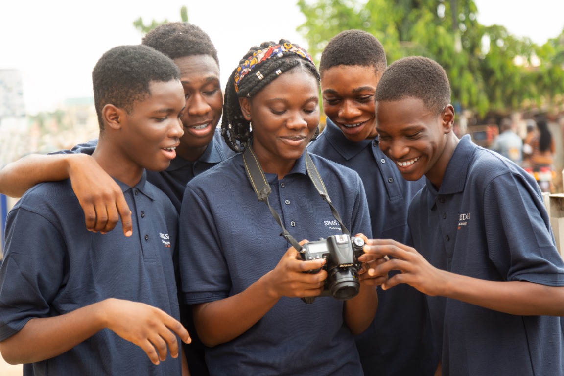 Academy students learning photography together